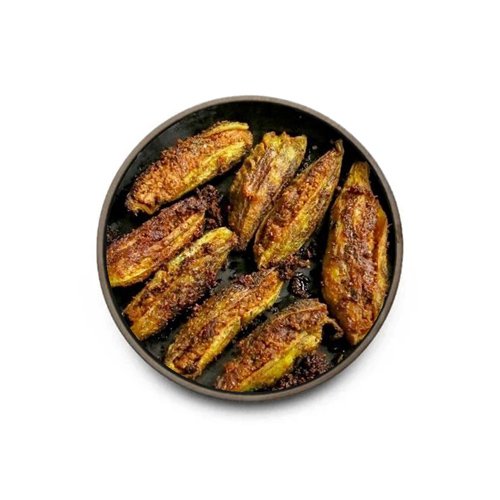Stuffed karela (bitter gourd) with light besan–onion masala—low-oil—Hyderabad